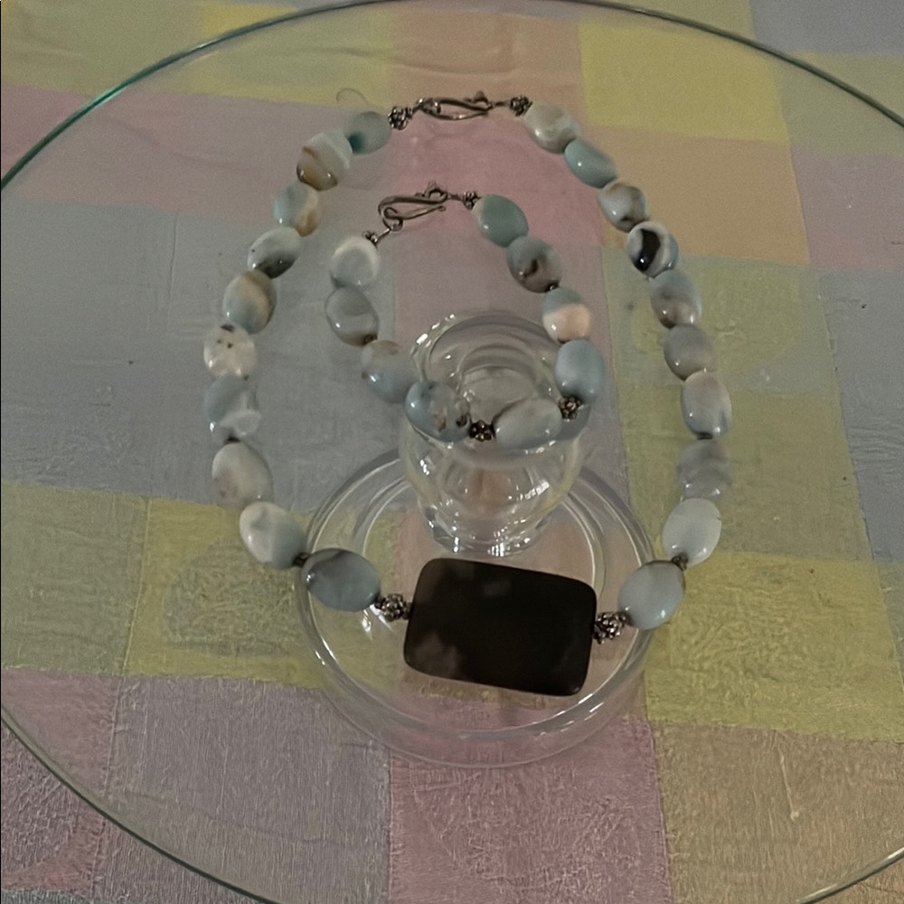Elegant Blue and Gray Necklace with Shimmering Beads